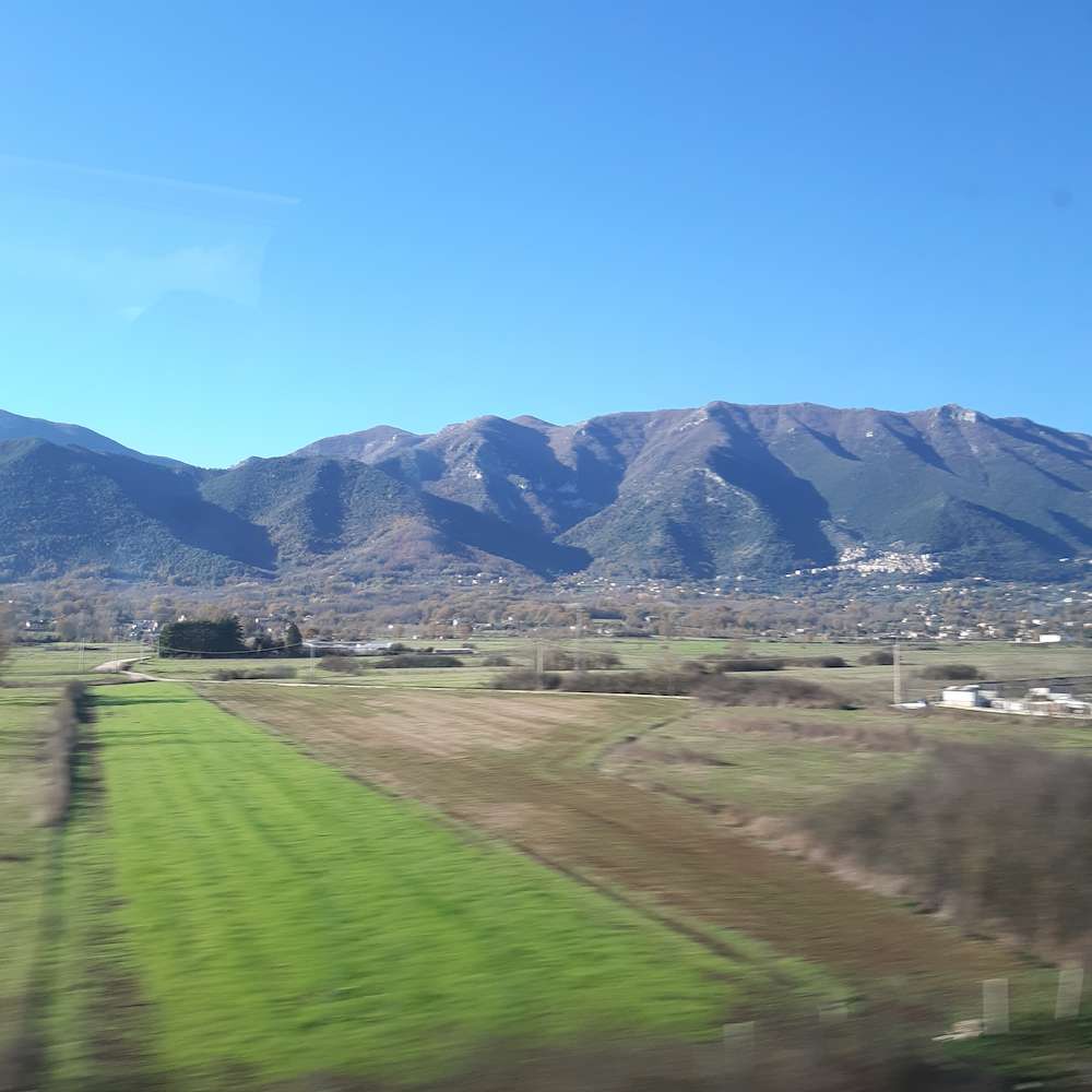 View of Italian mountains from window on Italo train